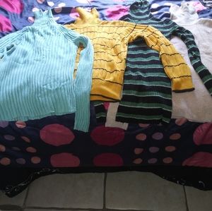Four turtlenecks